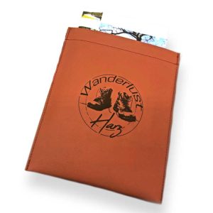 Schutzhülle_wanderpasshuelle_lederinband_dunkelbraunbraun_stempelheft_titelbild_bessla_praesentwerk_harz_badharzburg